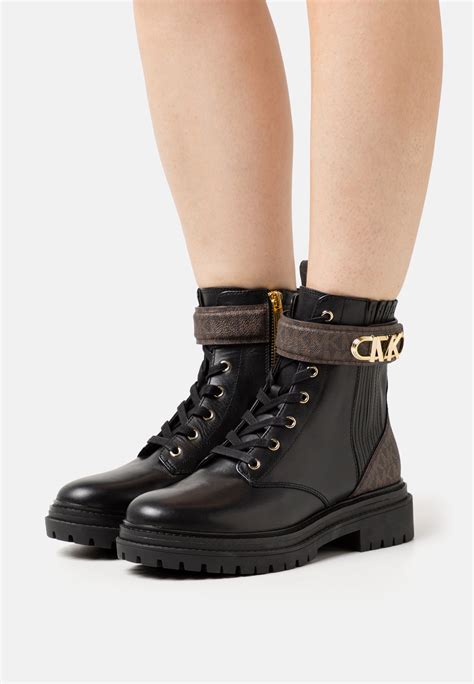 michael kors stiefel schwarz gold|Michael Kors gold shoes.